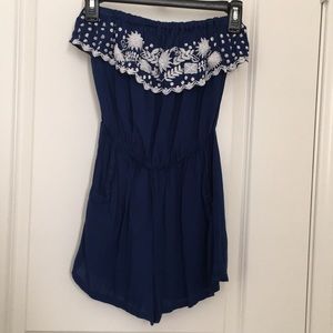 Ruffle romper with pockets
